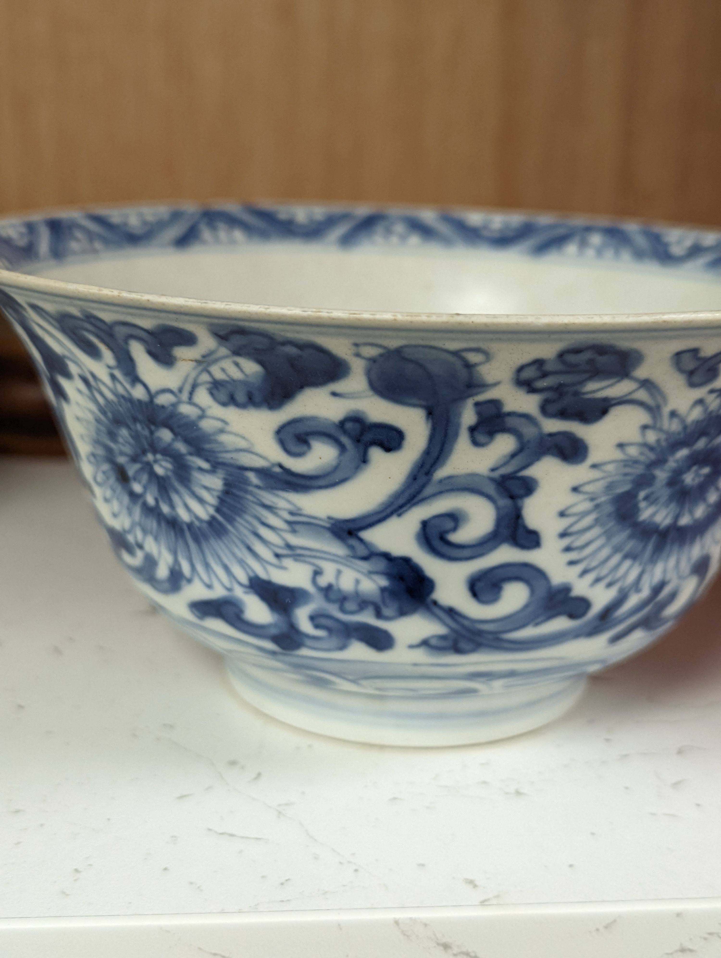 A Chinese blue and white bowl, Kangxi, 15cm. diam., a famille rose teapot stand, Yongzheng, and two doucai bowls